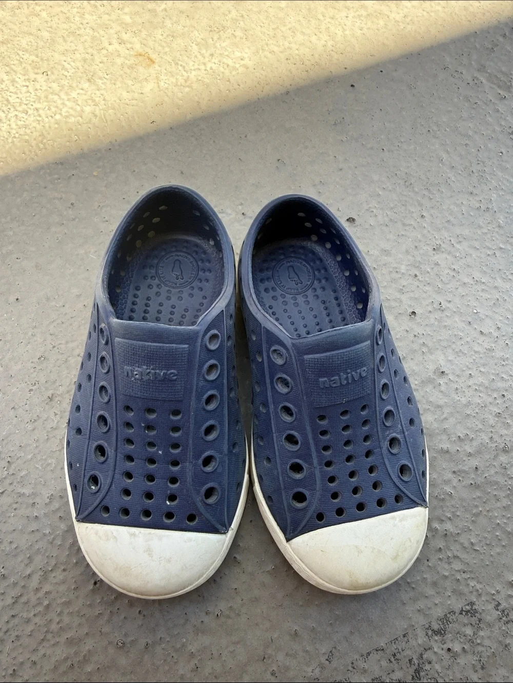 Native Navy Slip-On Sneakers with White Toe Cap